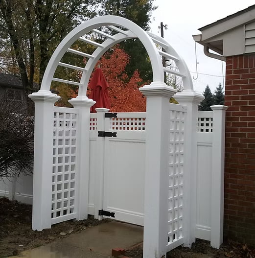 Decorative gate arch and lattice accents