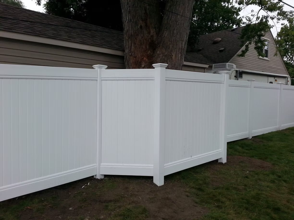 Vinyl fence along property line