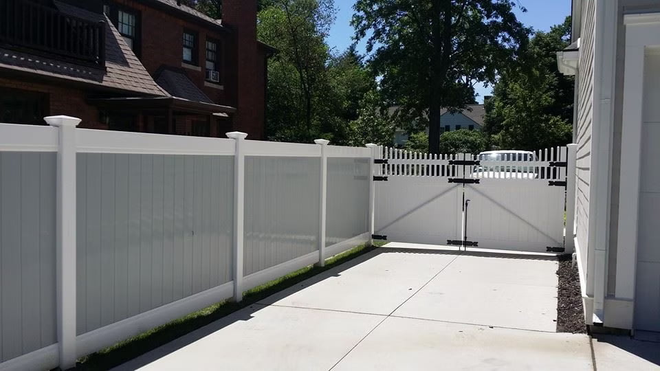 Two-tone, 6ft fencing with decorative post caps