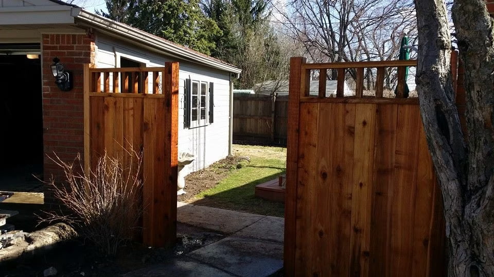 Cedar solid fence with accent top